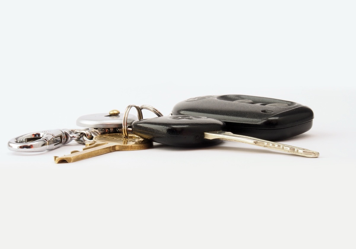 Modern car key fob and keys on a plain background, the signal target for relay theft devices