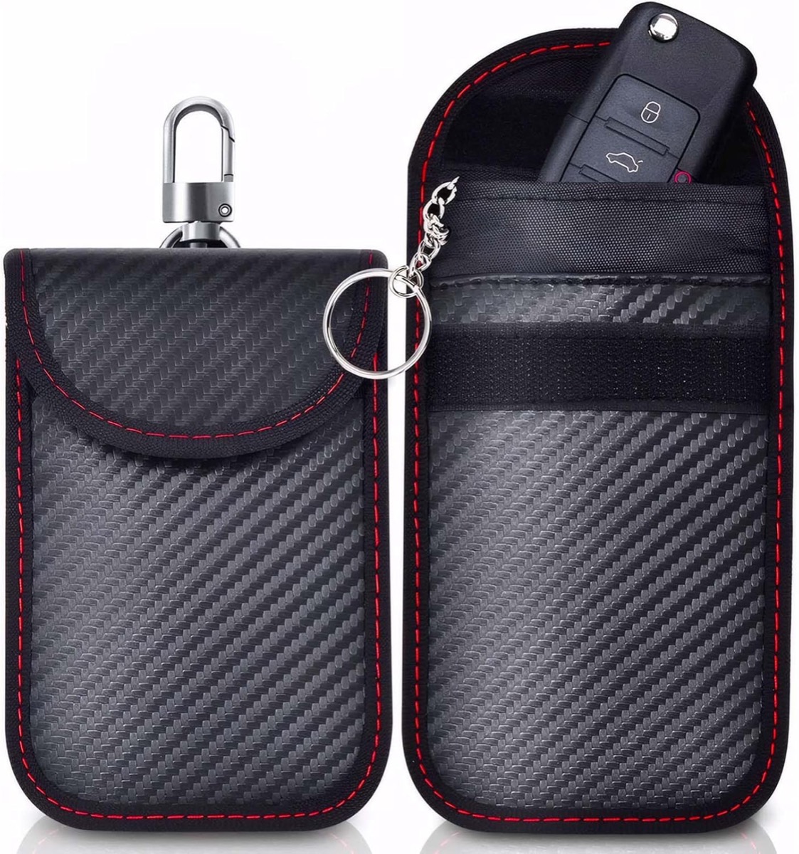 Carbon fibre style Faraday signal blocking pouches with a modern car key fob, used to block relay theft attacks
